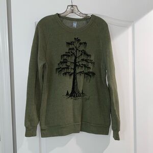 Woman’s long sleeve graphic Olive sweatshirt size L